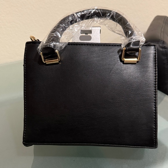 Bebe Quilted Black Satchel with Gold Details
